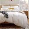 Unyqoos® Luxe wit beddengoedset van biologisch katoen met hoekbanden en kussenslopen
