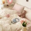 550x550-14461.jpg Unyqoos® Roze en wit gestreept beddengoed voor meisjes met strikken en ritssluiting