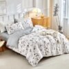 Unyqoos® Vierdelig beddengoed met botanisch motief en microvezel in wit en grijs