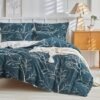 Unyqoos® Luxe beddengoedset met tropisch bladpatroon en kussenslopen, marineblauw