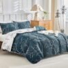 Unyqoos® Luxe beddengoedset met tropisch bladpatroon en kussenslopen, marineblauw