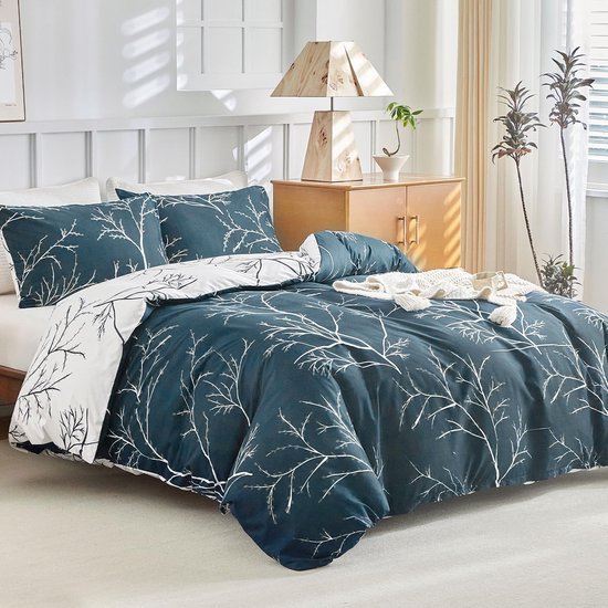 Unyqoos® Luxe beddengoedset met tropisch bladpatroon en kussenslopen, marineblauw