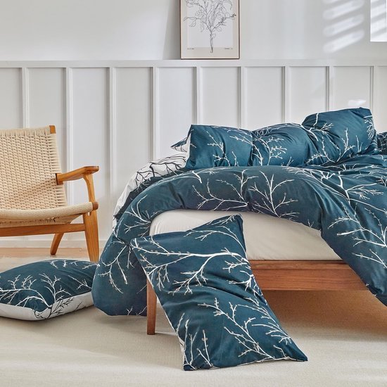 Unyqoos® Luxe beddengoedset met tropisch bladpatroon en kussenslopen, marineblauw