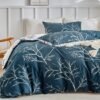 Unyqoos® Luxe beddengoedset met tropisch bladpatroon en kussenslopen, marineblauw