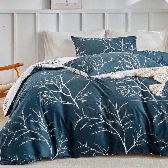 Unyqoos® Luxe beddengoedset met tropisch bladpatroon en kussenslopen, marineblauw