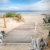 Unyqoos® Hoogwaardig vliesbehang met strand en zee motief voor een serene sfeer