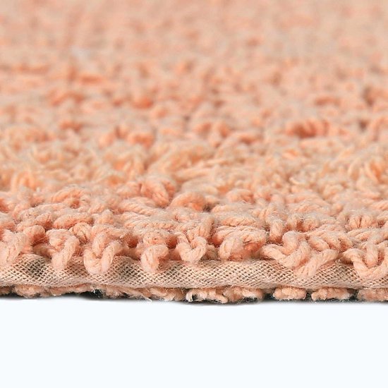 Unyqoos® Halfronde katoenen badmat in abrikoostint met omkeerbaar ontwerp 50x80 cm