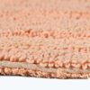 Unyqoos® Halfronde katoenen badmat in abrikoostint met omkeerbaar ontwerp 50x80 cm