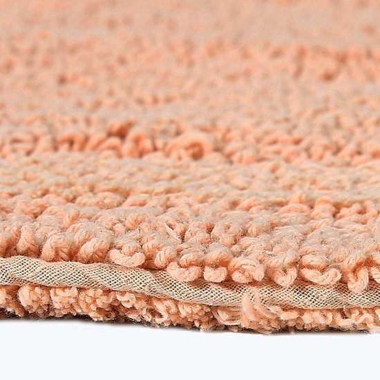 Unyqoos® Halfronde katoenen badmat in abrikoostint met omkeerbaar ontwerp 50x80 cm