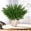 550x550-21359.jpg Unyqoos® Set van 6 kunstzinnige groene takken voor feestelijke decoratie