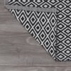 550x550-22411.jpg Unyqoos® Stijlvolle zwarte badmat met exotisch patroon voor badkamercomfort