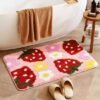 550x550-22677.jpg Unyqoos® Stijlvolle roze badmat met bloemen- en aardbeimotief en antislip onderzijde