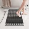 Unyqoos® Zwarte antislip badmat met voetmassage en afvoergat voor douche en badkuip