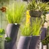 550x550-22930.jpg Unyqoos® Set van 24 decoratieve kunstplanten voor binnen en buiten, UV-bestendig