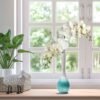 550x550-23307.jpg Unyqoos® Set van vier natuurgetrouwe kunsttakken met witte orchideebloemen