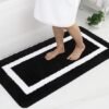 550x550-23386.jpg Unyqoos® Zwarte hoogpolige badmat met antislip en wasbare microvezels 60x120 cm