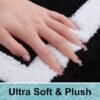 550x550-23388.jpg Unyqoos® Zwarte hoogpolige badmat met antislip en wasbare microvezels 60x120 cm