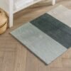 Unyqoos® Lichtgrijze badmat met antislip en sneldrogende eigenschappen voor badkamers