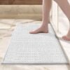 Unyqoos® Zachte en absorberende badmat met antislip voor badkamer en douche