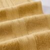 Unyqoos® Luxe 6-delige handdoekenset met omkeerbaar jacquard ontwerp in goud