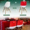 550x550-28250.jpg Unyqoos® Set van 4 decoratieve stoelhoezen met kerstmanhoeden voor feestelijke tafeldecoratie