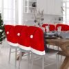 550x550-28253.jpg Unyqoos® Set van 4 decoratieve stoelhoezen met kerstmanhoeden voor feestelijke tafeldecoratie