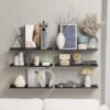 550x550-29584.jpg Unyqoos® Zwarte metalen wandrekken set van 2 voor decoratieve en praktische opbergruimte