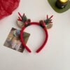 Unyqoos® Feestelijke haarband met rendiergewei en kerstdecoraties voor dames