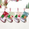550x550-32575.jpg Unyqoos® Set van vier decoratieve kerstkousen met feestelijke motieven voor sfeervolle kerstdecoratie