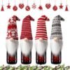 550x550-32789.jpg Unyqoos® Set van 4 feestelijke flessenhoezen voor wijn en sterke drank met kerstsfeer