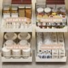 550x550-34678.jpg Unyqoos® Uittrekbare keukenlade zonder boren voor optimale kastorganisatie