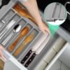 550x550-34805.jpg Unyqoos® Verstelbare grijze bestekbak met antislip en 6 tot 8 vakken voor keukenladen