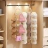 550x550-43237.jpg Unyqoos® Ruimtebesparende hoeden- en accessoirehouder met 12 draaibare haken voor diverse items