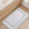Unyqoos® Extra zachte witte badkamermat met antislip en hoge waterabsorptie