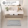 Unyqoos® Zachte Microvezel Badmat met Antislip en Hoge Waterabsorptie voor Badkamer, 40 x 60 cm, Lichtgrijs