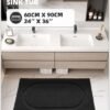Unyqoos® Zwarte zachte badmat met antislip en waterabsorberend microvezelmateriaal