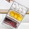 550x715-38.jpg Unyqoos® Transparante en stapelbare koelkastopbergdoos met afdruipmand en handgreep
