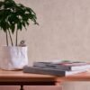 Unyqoos® Hoogwaardig vliesbehang met natuurlijke pleisterlook in zand en beige