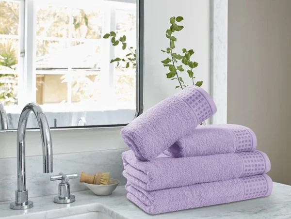 Unyqoos® Extra Grote Luxe Handdoekenset van 4 Stuks voor Comfort en Absorptie