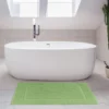 Unyqoos® Deluxe Set van Twee Zachte en Absorberende Badmatten in Salie-Groen Katoen