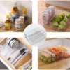 P-87213230558823-20260406094426.webp Unyqoos® Set van Drie Koelkastorganizers in Verschillende Maten voor Efficiënte Opslag