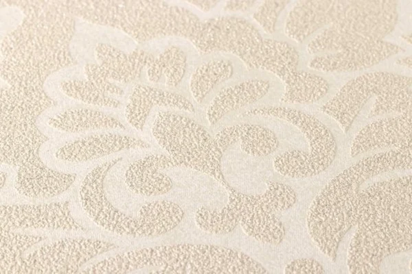 P-87213234306651-20260405113659.webp Unyqoos® Elegant vliesbehang met barokke ornamenten in beige en crèmetinten