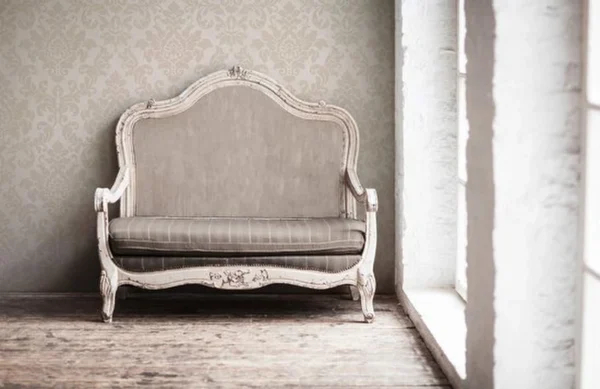 P-87213234306654-20260405113714.webp Unyqoos® Elegant vliesbehang met barokke ornamenten in beige en crèmetinten