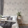 Unyqoos® Vliesbehang met abstract bloemendesign en metallic accenten in beige tint
