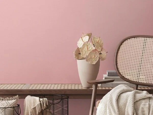 Unyqoos® Effen roze vliesbehang met structuur voor een stijlvolle woonruimte