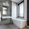 P-87213236509022-20260405113234.webp Unyqoos® Waterdicht grijs steenlook plakbehang voor muren en keuken 44x300 cm