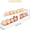 P-87213236762304-20260406094617.webp Unyqoos® Ruimtebesparende automatische eierhouder met antislip functie voor keuken en koelkast