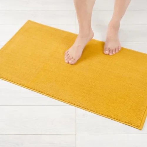 Unyqoos® Zachte en Luxe Antislip Badmat van 100% Katoen in Mosterdgeel, 51 x 86 cm, Sneldrogend en Wasbaar