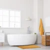 Unyqoos® Zachte Antislip Badmat in Okergeel - Comfort en Veiligheid voor de Badkamer