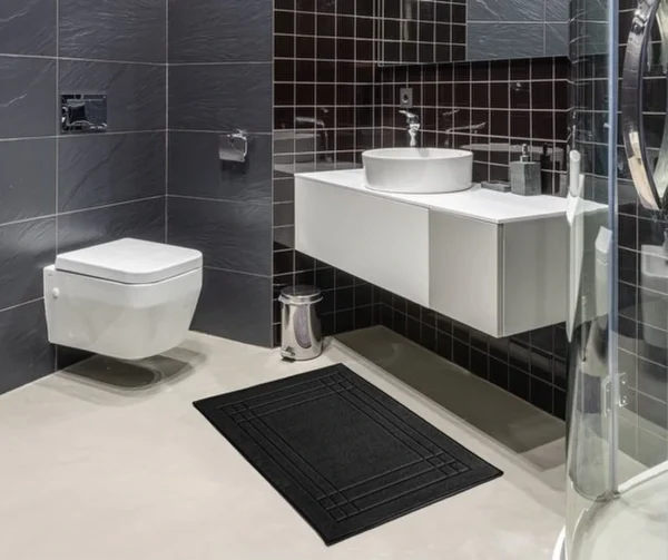 P-87213239667373-20260405135853.webp Unyqoos® Zwarte katoenen badmat 50x70 cm voor moderne en comfortabele badkamer